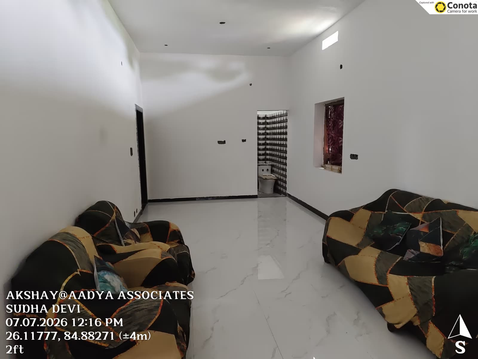 Bedroom with marble flooring and built-in storage by MakeHouse in Dhanbad, Jharkhand